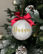 Nannu round Christmas KS Creations bauble filled with feathers and gold font