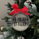 Il Milied it Tajjeb round Christmas KS Creations bauble filled with snow and black font