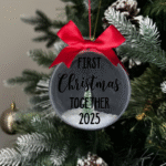 First Christmas Together 2025 round Christmas KS Creations bauble filled with snow and tree and black font